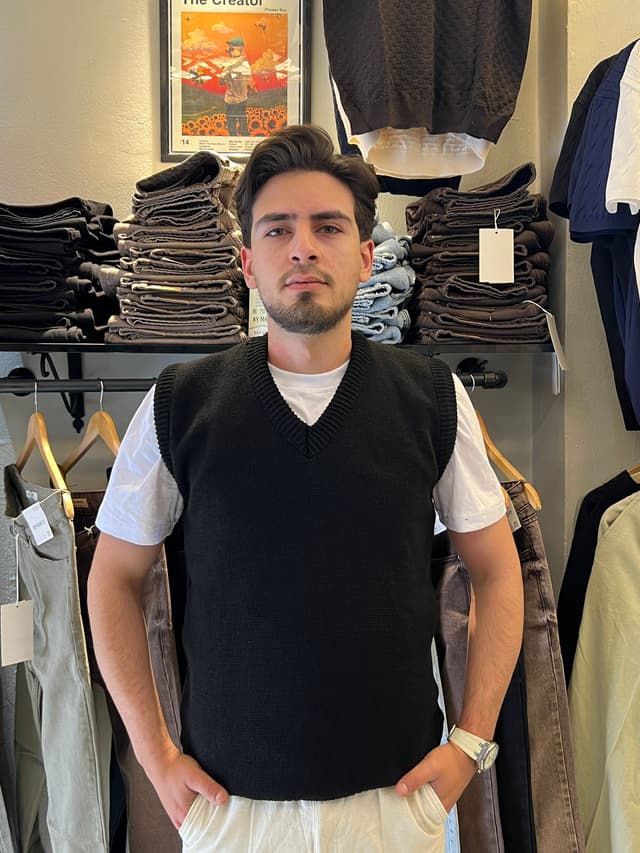 Black sweater vest